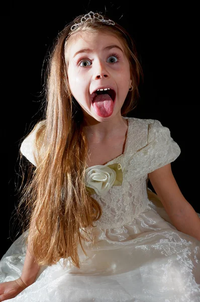 Prinzessin streckt die Zunge heraus — Stockfoto