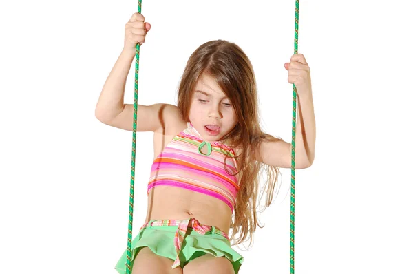 Cute little girl swinging — Stock Photo, Image