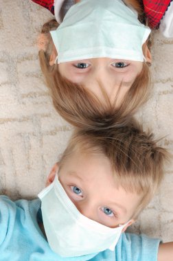 Children with pretection flu mask clipart