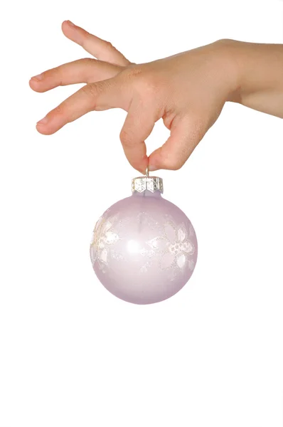 Ball decoration in a hand — Stock Photo, Image