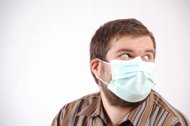 Man wearing a surgical mask clipart