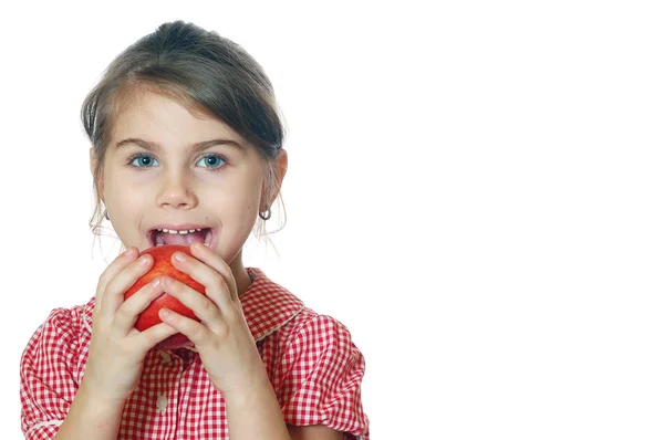 Dívka kousat jablko — Stock fotografie