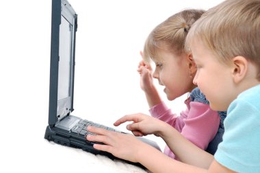 Children playing computer games clipart