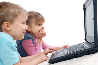 Children playing computer games clipart
