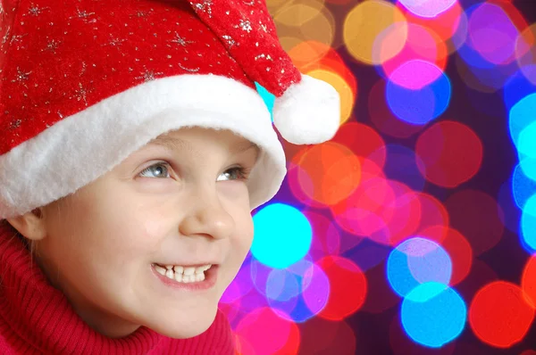 Bonito pequeno sorriso chapéu de Natal criança — Fotografia de Stock