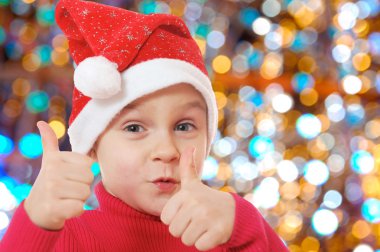 Cute little smiling Christmas hat child clipart