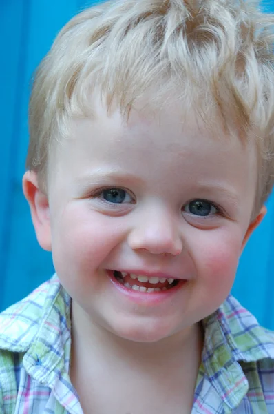 Smiling little blond toddler boy — Stock Photo, Image