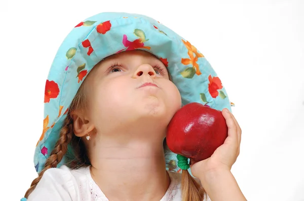 Ребенок с яблоком — стоковое фото