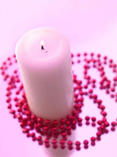 Bodegón de vacaciones con velas en rosa —  Fotos de Stock