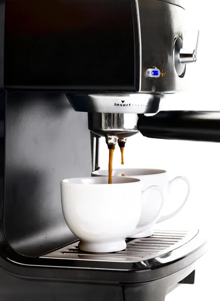 Máquina de café com duas xícaras de café — Fotografia de Stock