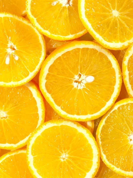 Fresh tasty oranges as background on the — Stock Photo, Image