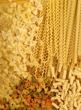 Italian pasta background. food assortmen clipart