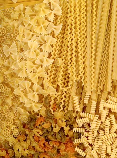 Italiaanse pasta achtergrond. levensmiddelen assortmen — Stockfoto