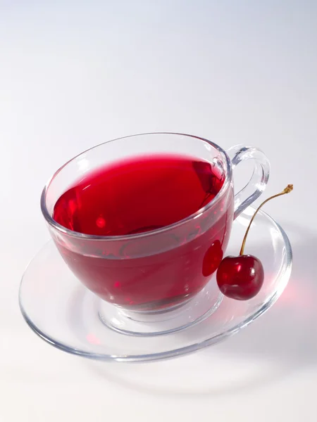 Hibiscus herbal tea in glass cup with ri — Stock Photo, Image