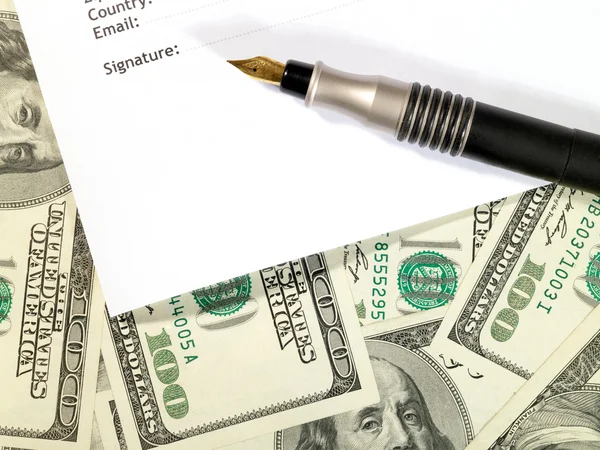 stock image Money background under the contract form