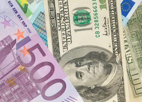 Money background from dollars and euro b — Stock Photo, Image