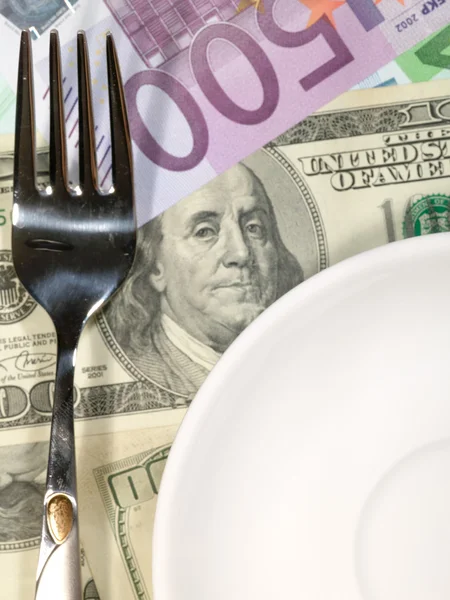 Hintergrund des Abendessens. Dollar und E — Stockfoto