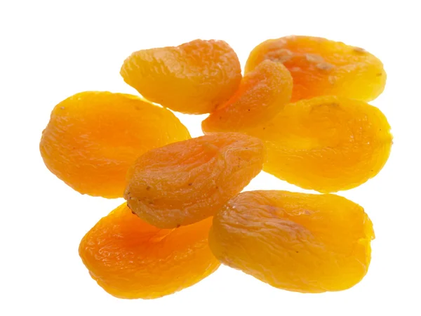 Sušené meruňky, izolované na bílém — Stock fotografie