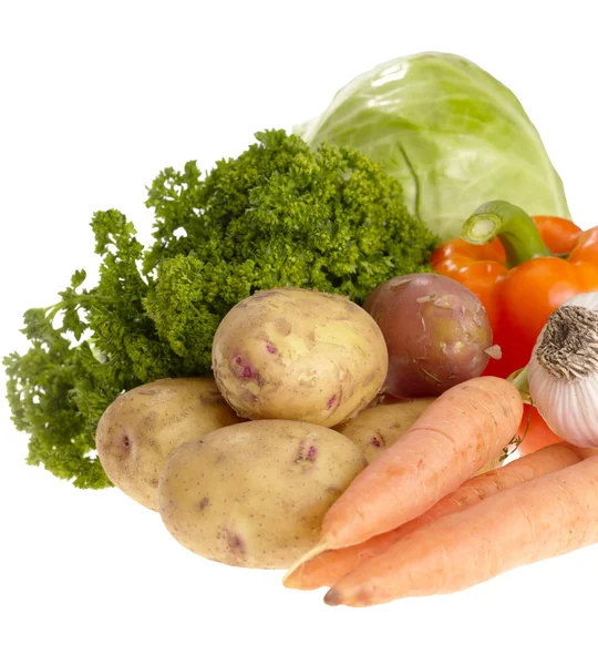 Verduras saborosas frescas em backgrou branco — Fotografia de Stock