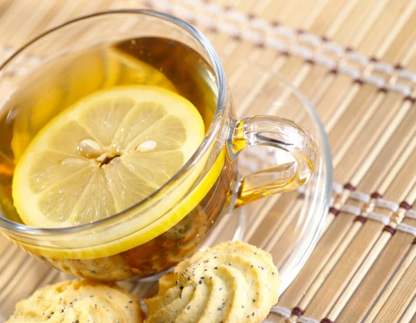 Tea with lemon fruit on bamboo backgroun — Stock Photo, Image