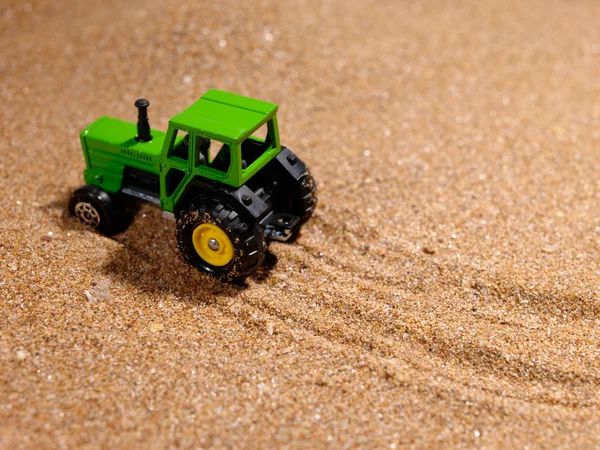 Wheelrd tractor on the new land still-li — Stock Photo, Image