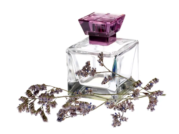 Vidrio de perfume con brezo — Foto de Stock