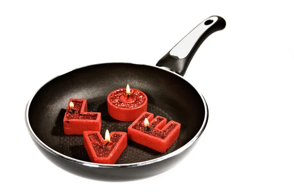 Branden van liefde op de koekenpan. — Stockfoto