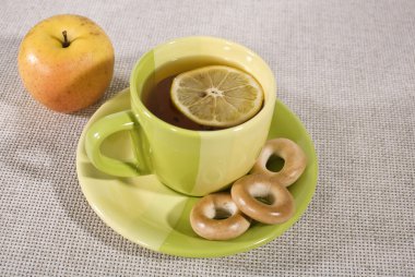 Tea cup on the desk clipart