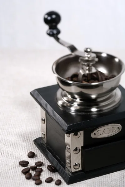 Coffee grinder with beans — Stock Photo, Image