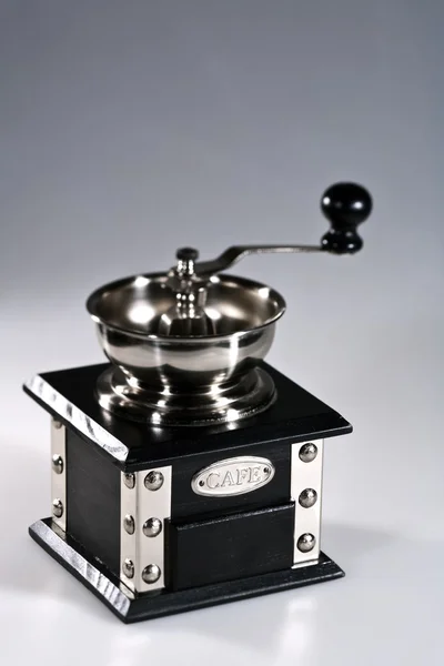 Coffee grinder on grey — Stock Photo, Image