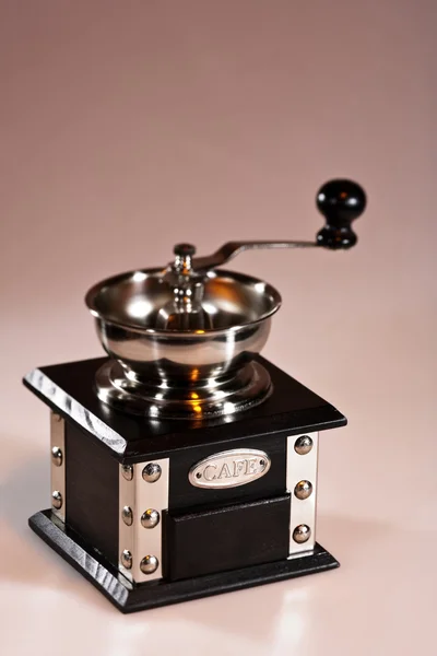 Coffee grinder with orange backlite — Stock Photo, Image