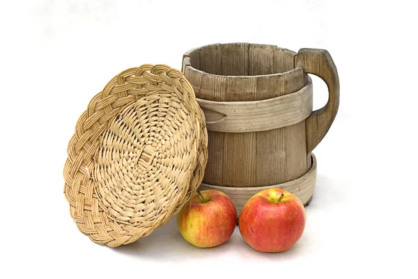 Two red apples and wooden crockery — Stock Photo, Image