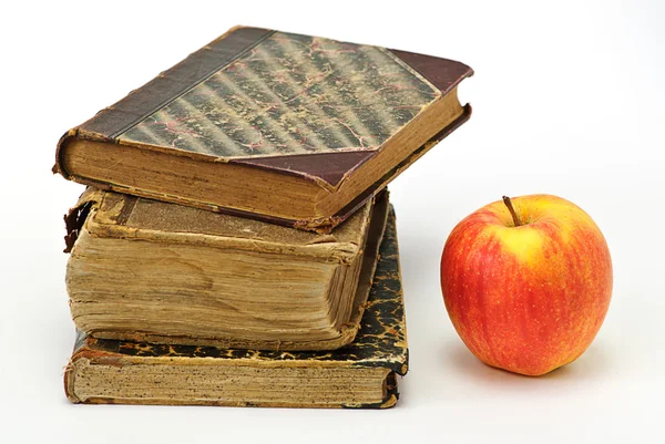 Old books and aplle — Stock Photo, Image