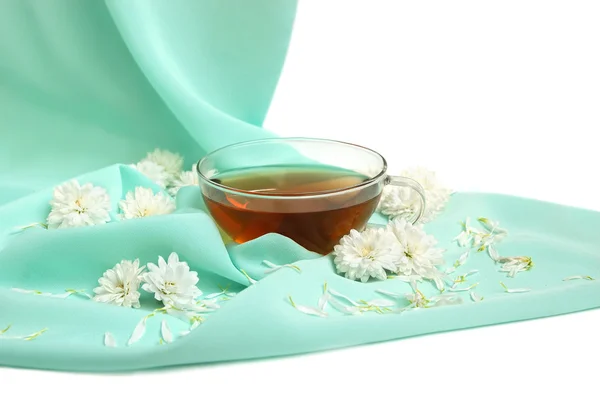 Copo de chá de vidro e flores — Fotografia de Stock