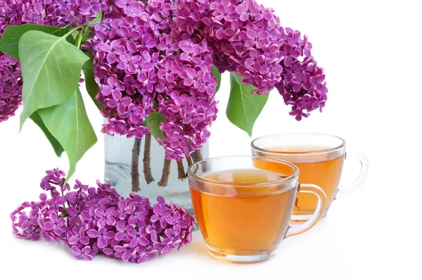 Tea and lilac — Stock Photo, Image
