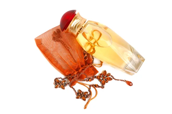 Parfum en een ketting — Stockfoto