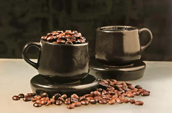 Two cups and coffee beans — Stock Photo, Image
