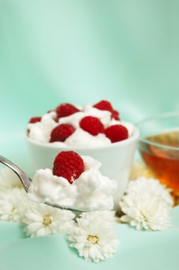 Raspberrys with white whipped cream clipart