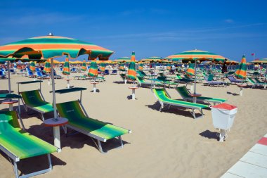 beach chairs on the sea  clipart