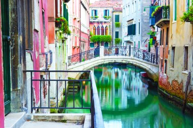 colorful canal in venice, italy  clipart