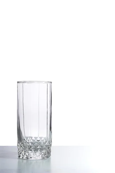 Tiga gelas terisolasi di atas meja — Stok Foto