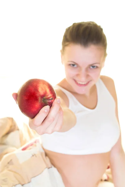 Apfel und verschwommene Frau — Stockfoto