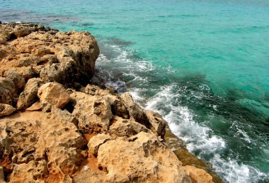 Sea landscape with rock, Cyprus. clipart