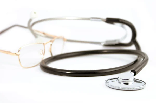 Stethoscope and glasses — Stock Photo, Image