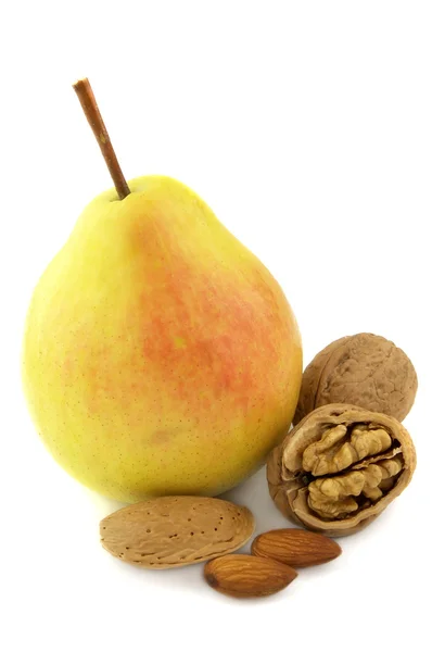 Pear and nuts — Stock Photo, Image