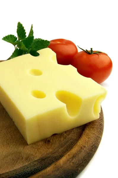 Cheese with tomat and melissa — Stock Photo, Image