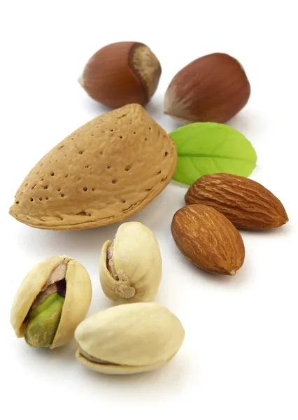 Almonds and hazelnuts with pistachio — Stock Photo, Image