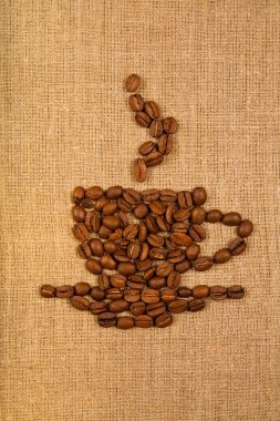 Coffee cup over canvas background