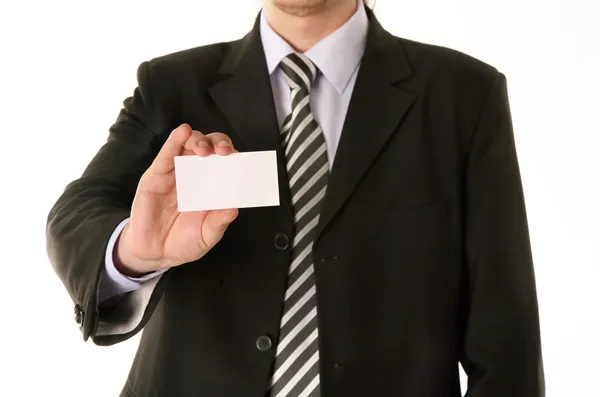 Empresário segurando cartão de visita em branco — Fotografia de Stock