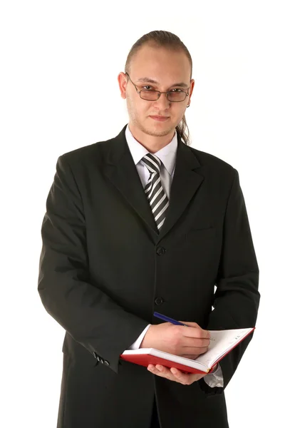 Biznesmen w okularach planowania jego dzień — Zdjęcie stockowe